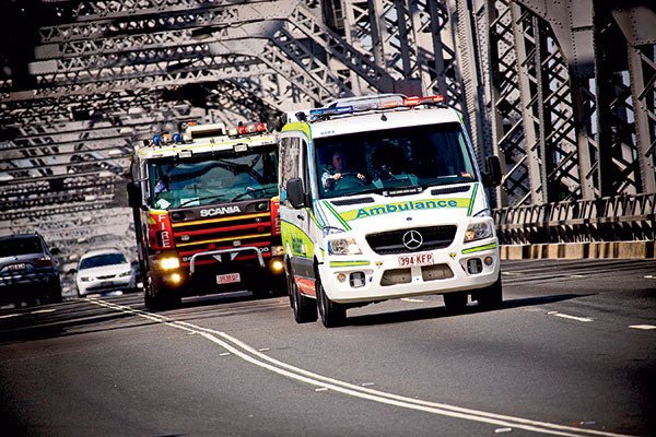 Sharing the road with an ambulance while towing - Caravan World Australia